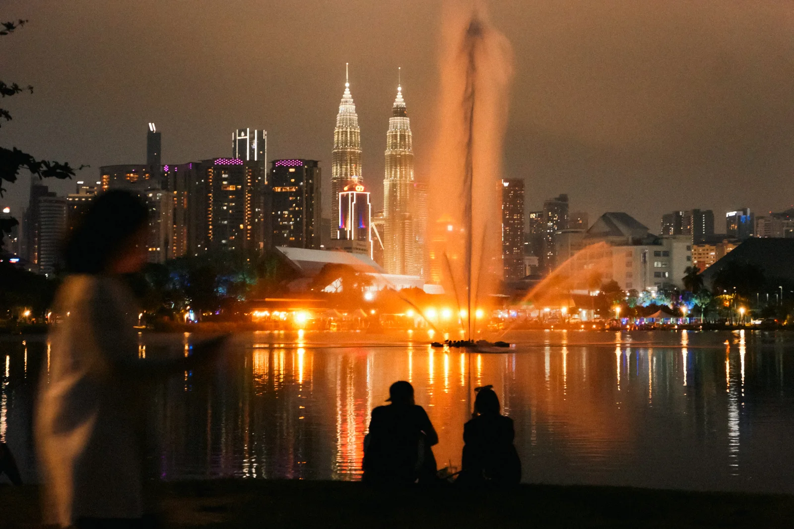 A couple watching the night fountain show