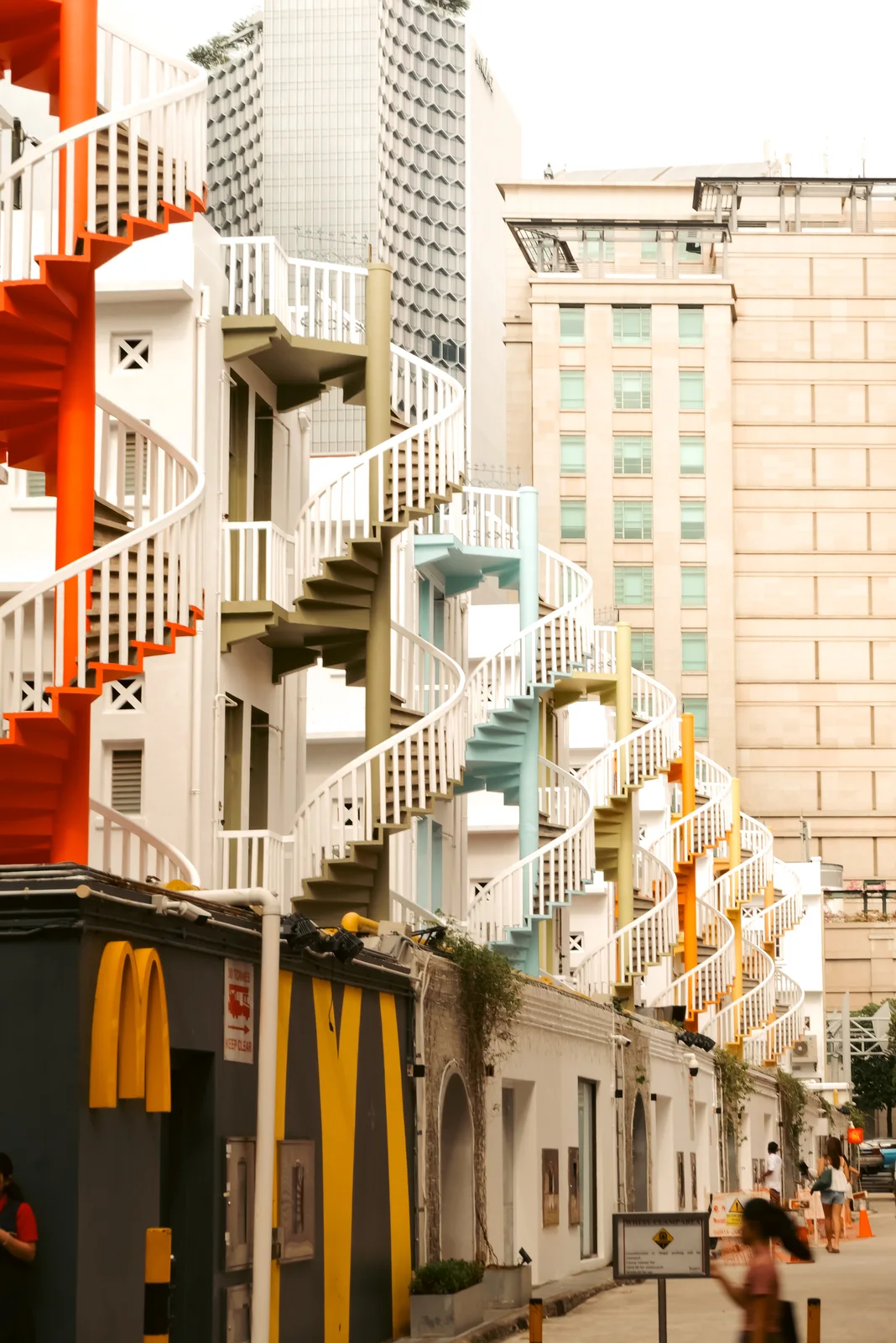 Colorful spiral staircases between apartment blocks