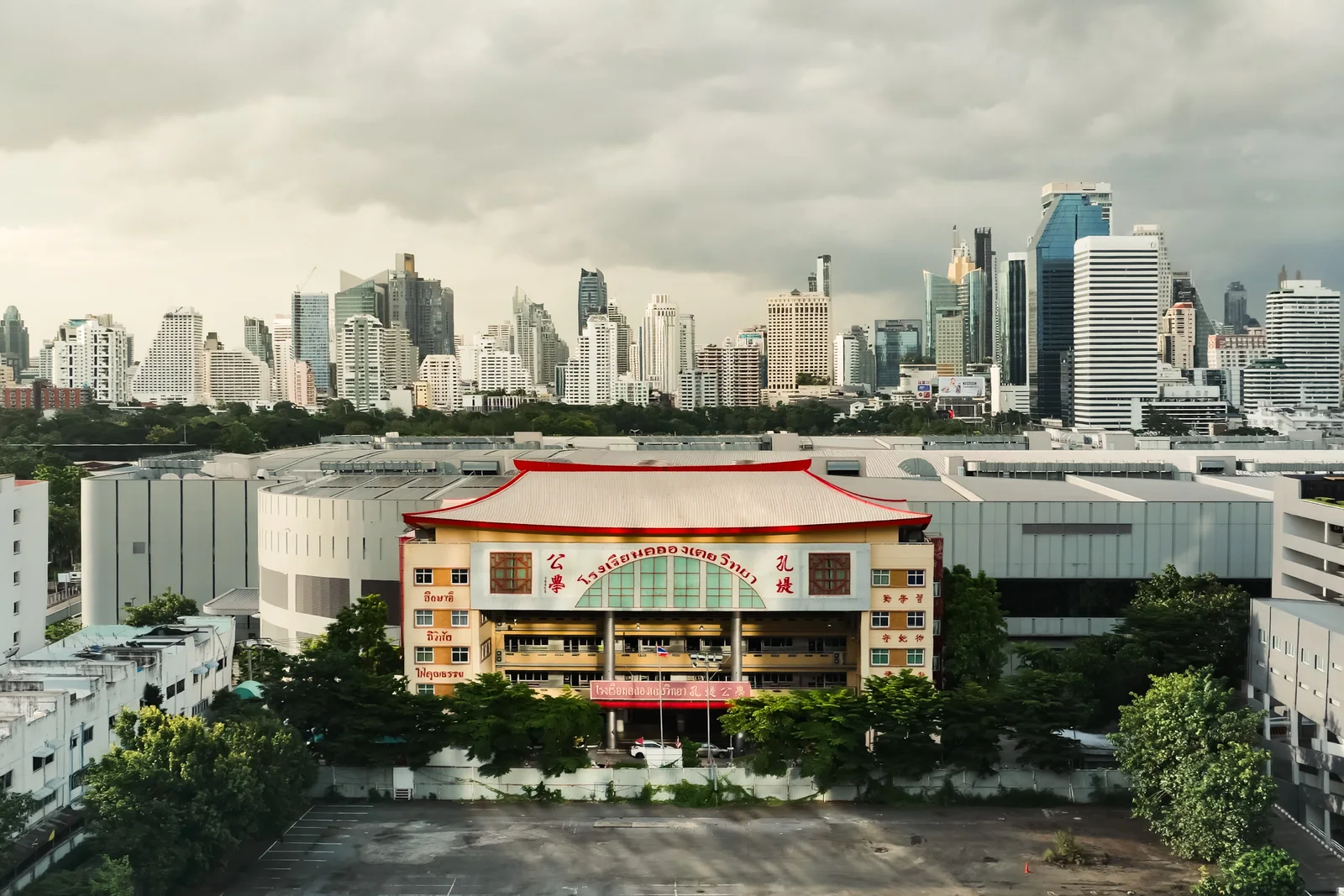 The Bangkok skyline behind an older building